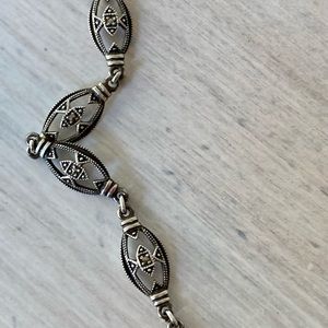 Antique Oval Silver Detailed Necklace With Open Box Closure.